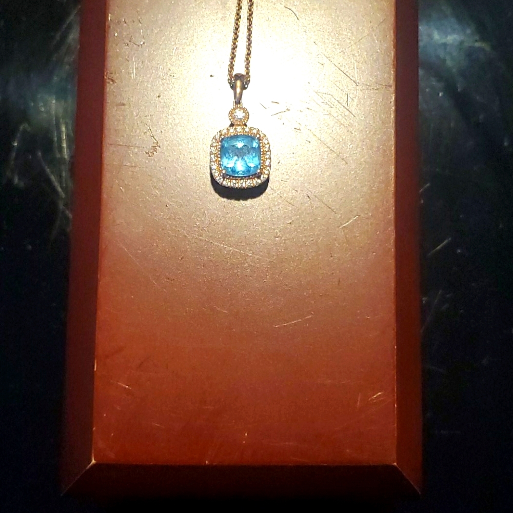 Blue Topaz and Diamond 14kt Rose Gold pendant.